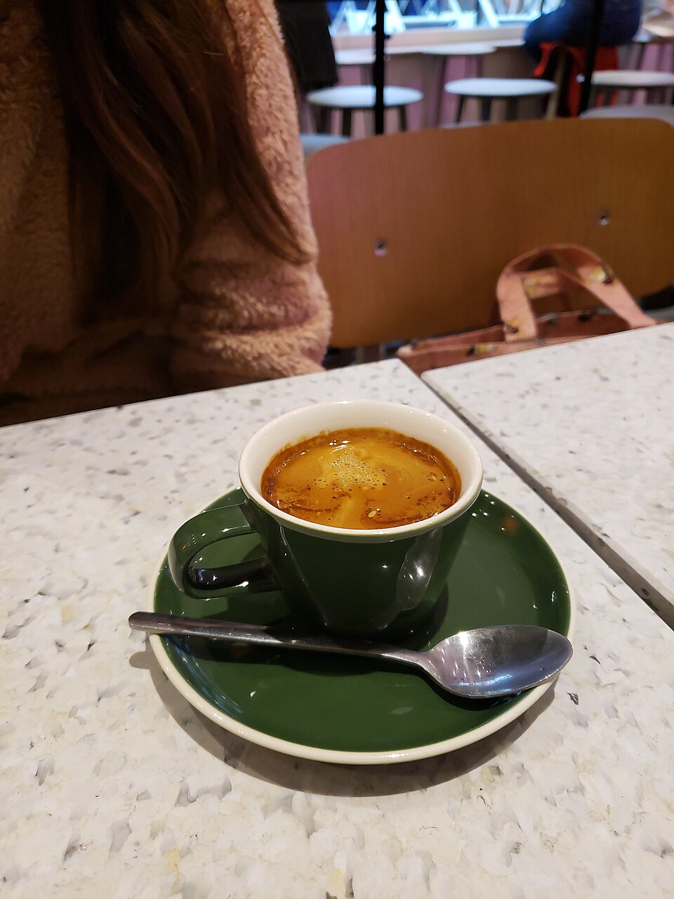 A source-identified long black at 17 GRAMS, Brighton, UK. Cup capacity, dose and espresso yield are not visible measurements.