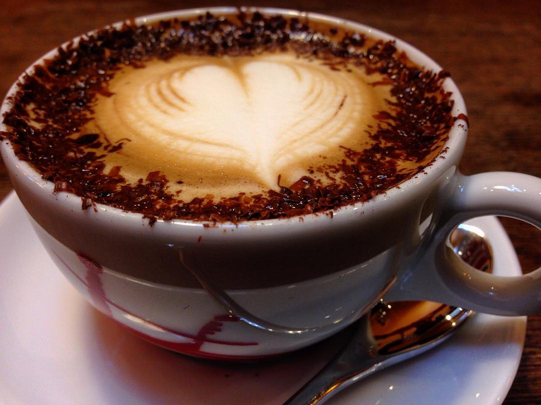 Source-identified Marocchino in a ceramic cup. It is a serving variation, not the small-glass presentation of the featured method.