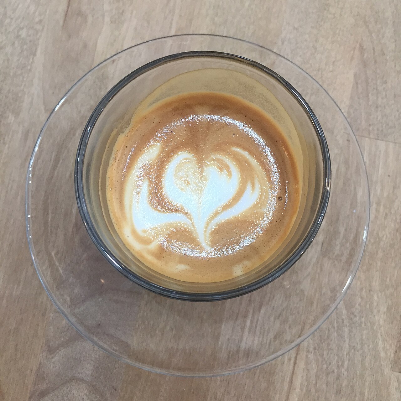 Piccolo latte art photographed by Bex Walton in London. Glass capacity and espresso recipe cannot be inferred from the photograph.