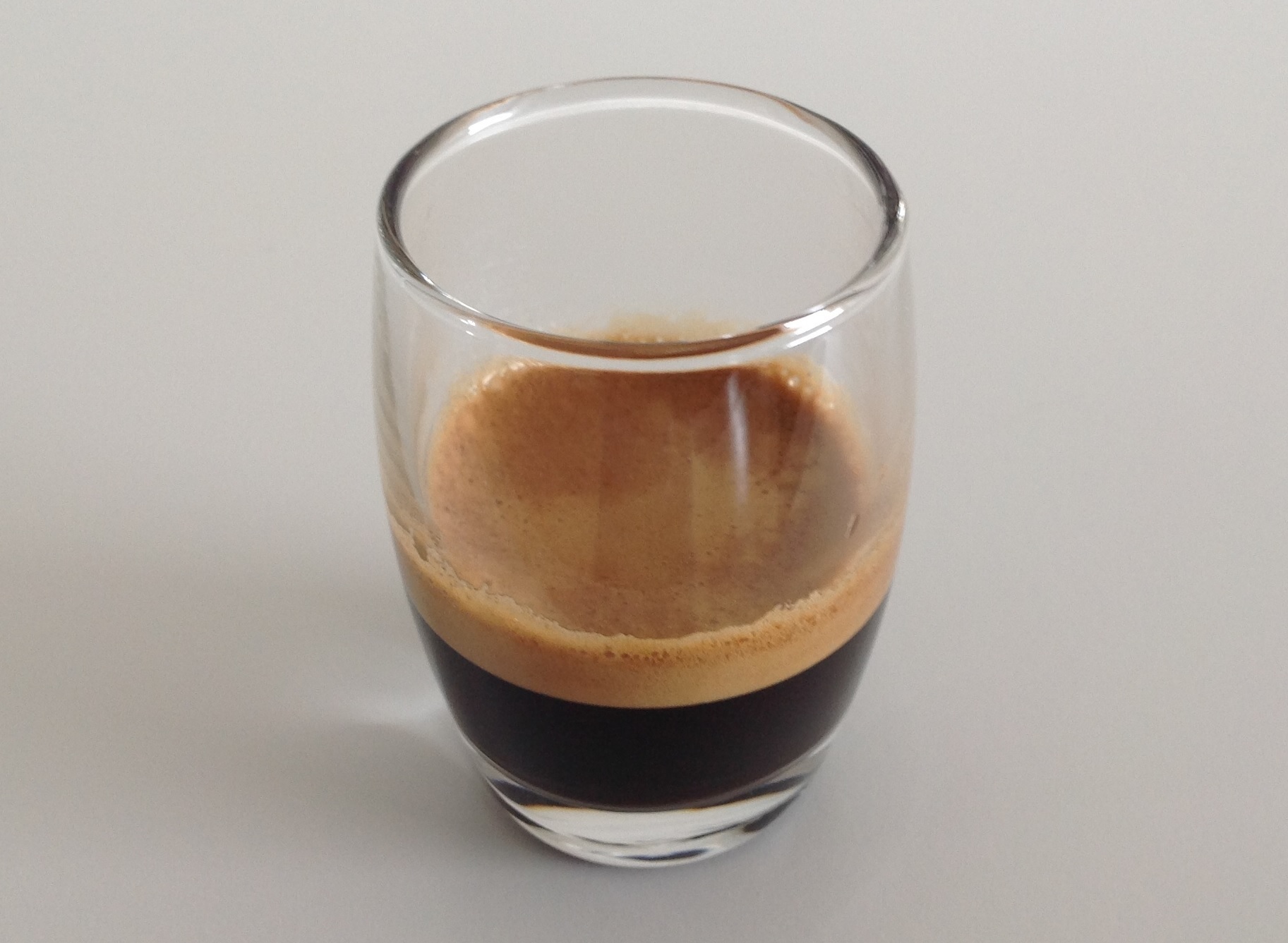 A source-identified ristretto in a glass. Crema does not prove its recipe, extraction yield or taste.