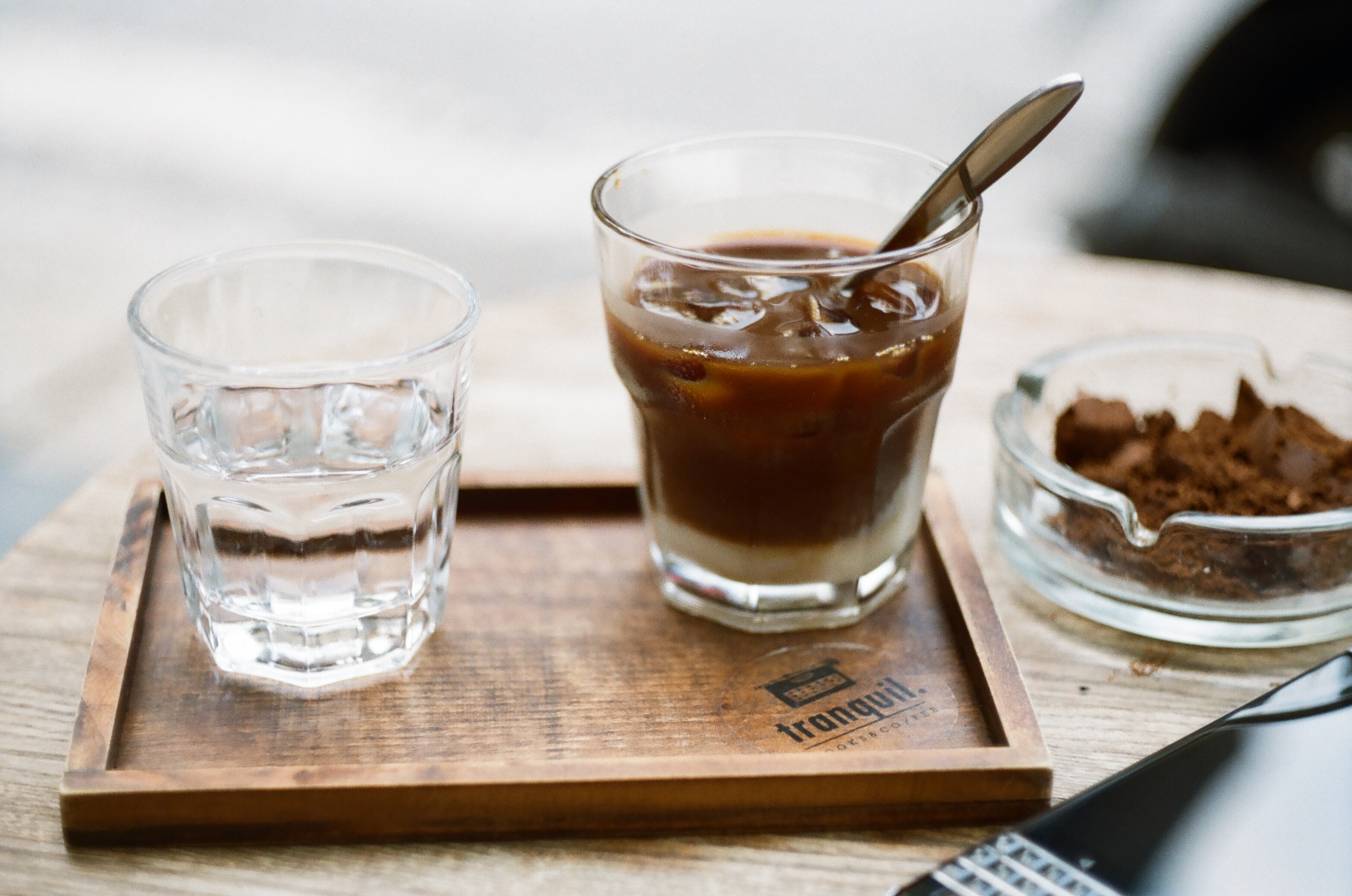 Vietnamese iced milk coffee with ice and condensed milk visible before stirring. The photograph does not establish the featured recipe quantities.